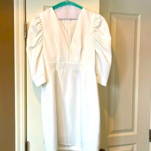 White quarter length sleeve size small white dress. New without tag.